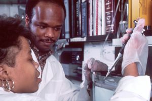 man and woman doing laboratory works
