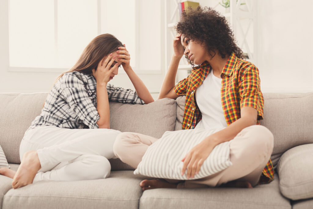 Two women having a serious and trusting conversation